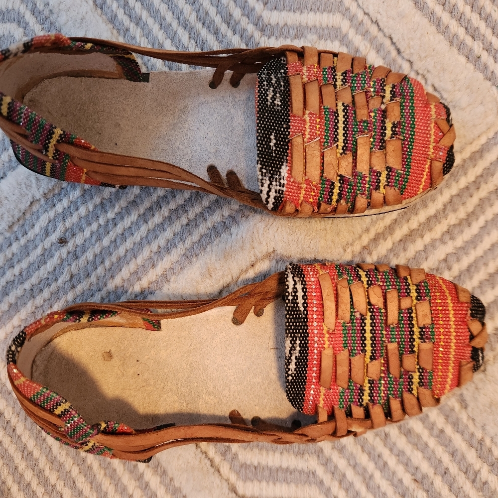 Multi colored moccasins. Size 3. Worn handful of times.